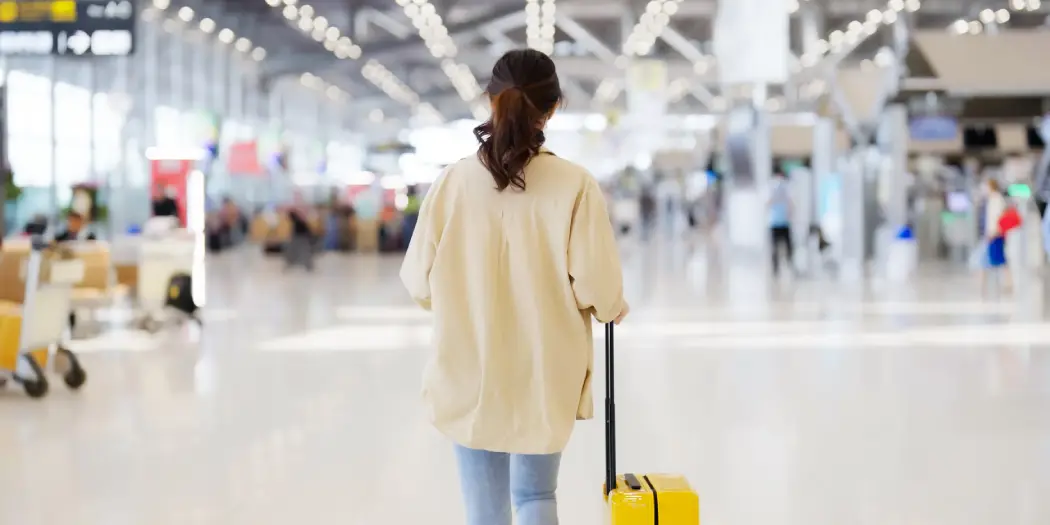 Chloe Harrison at the airport terminal
